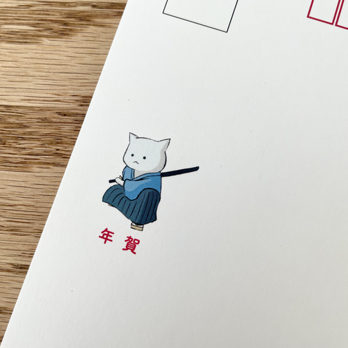 2026 年賀状 ポストカード 5枚入り 木馬に乗って新年を祝う侍ねこ