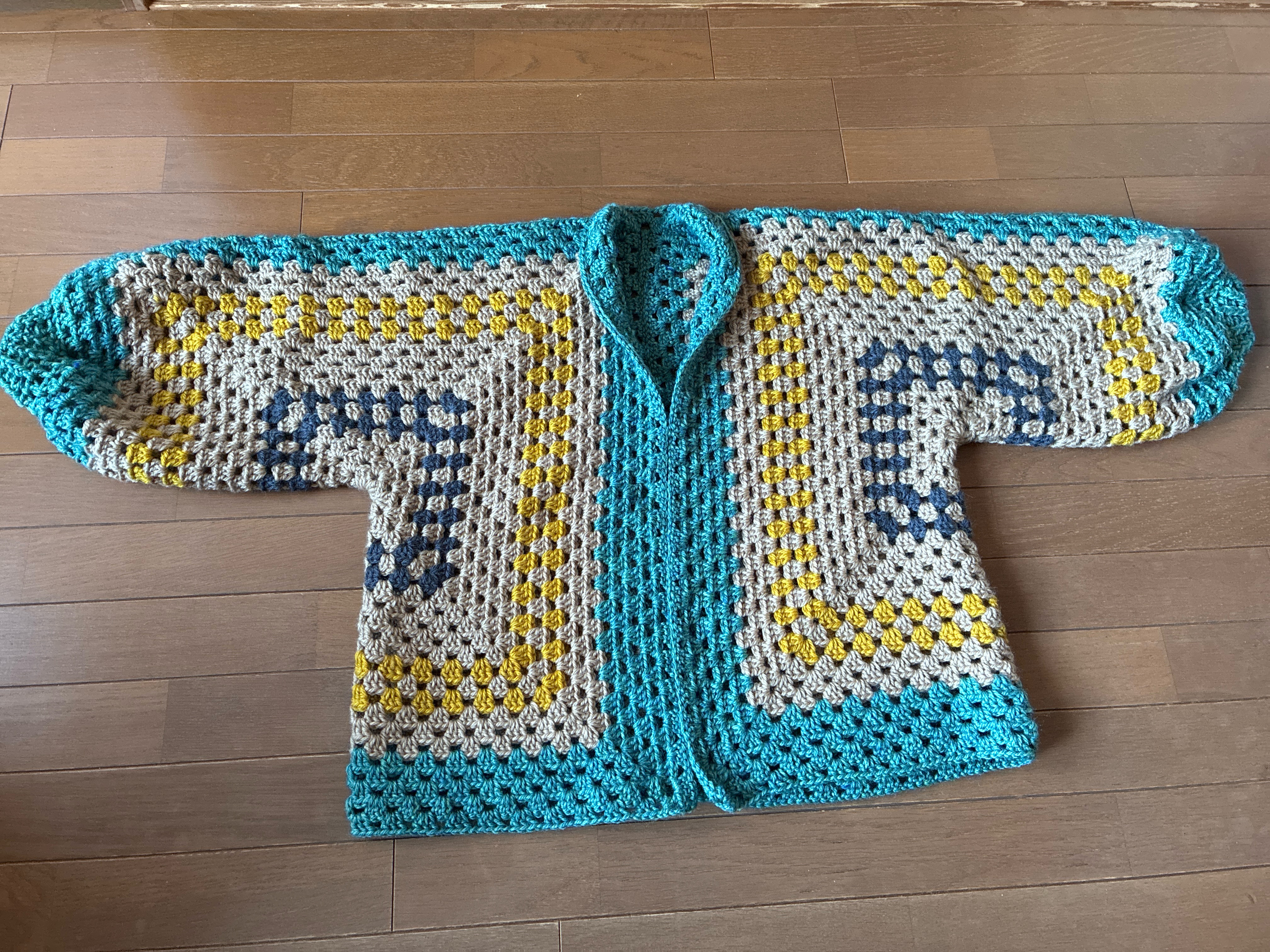 手編みヘキサゴンカーディガン 15,762円