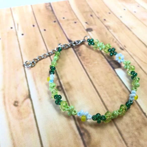 ハンドメイド 顔ビーズ ブレスレット スマイル オレンジ ビーズブレスレット15cm ハンドメイドの通販 by