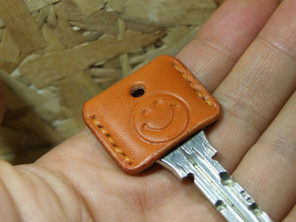スマイル刻印のキーカバー オレンジ 2枚目の画像