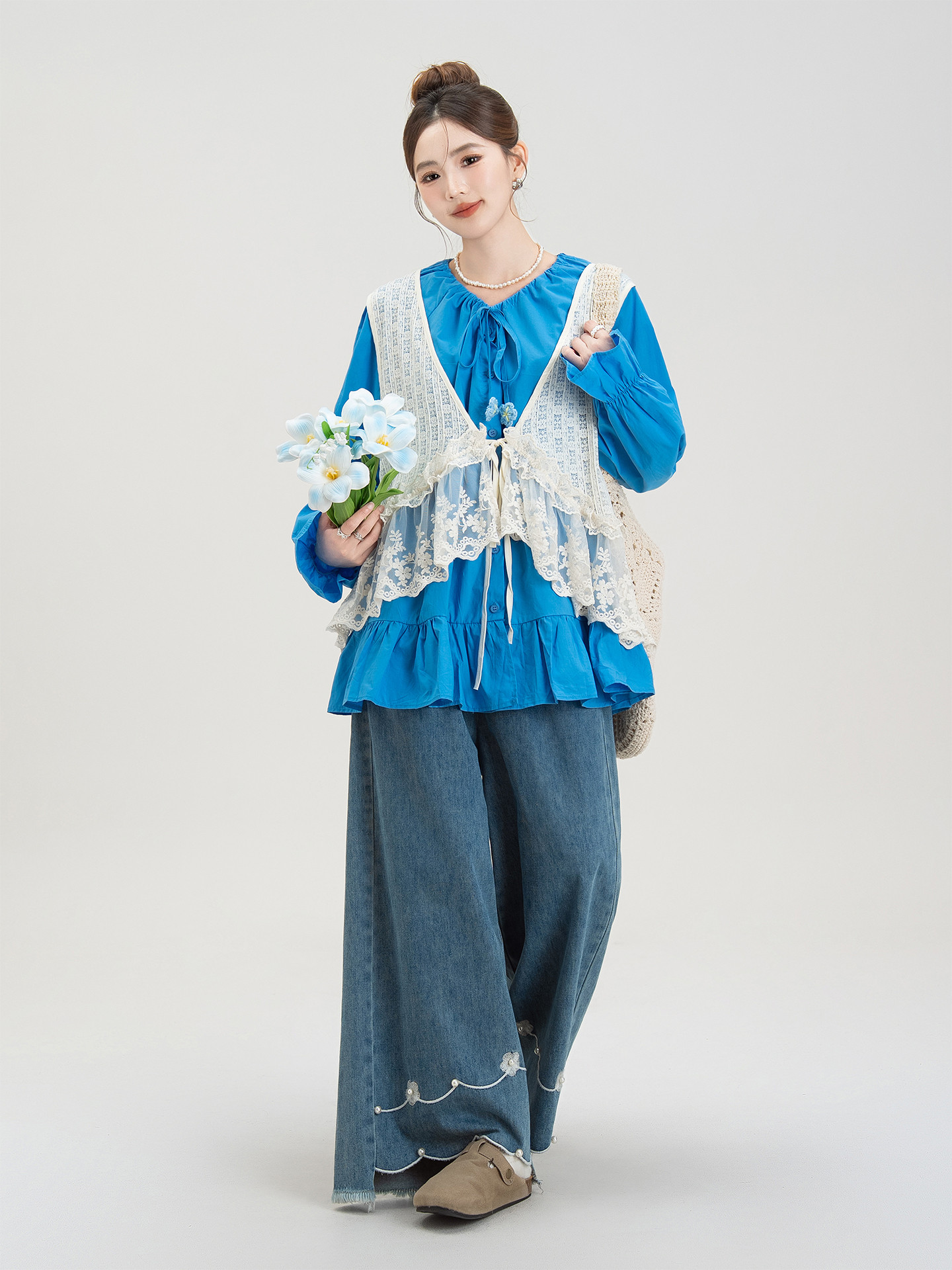 青いフリルのパッチワーク長袖シャツレディース早秋新作