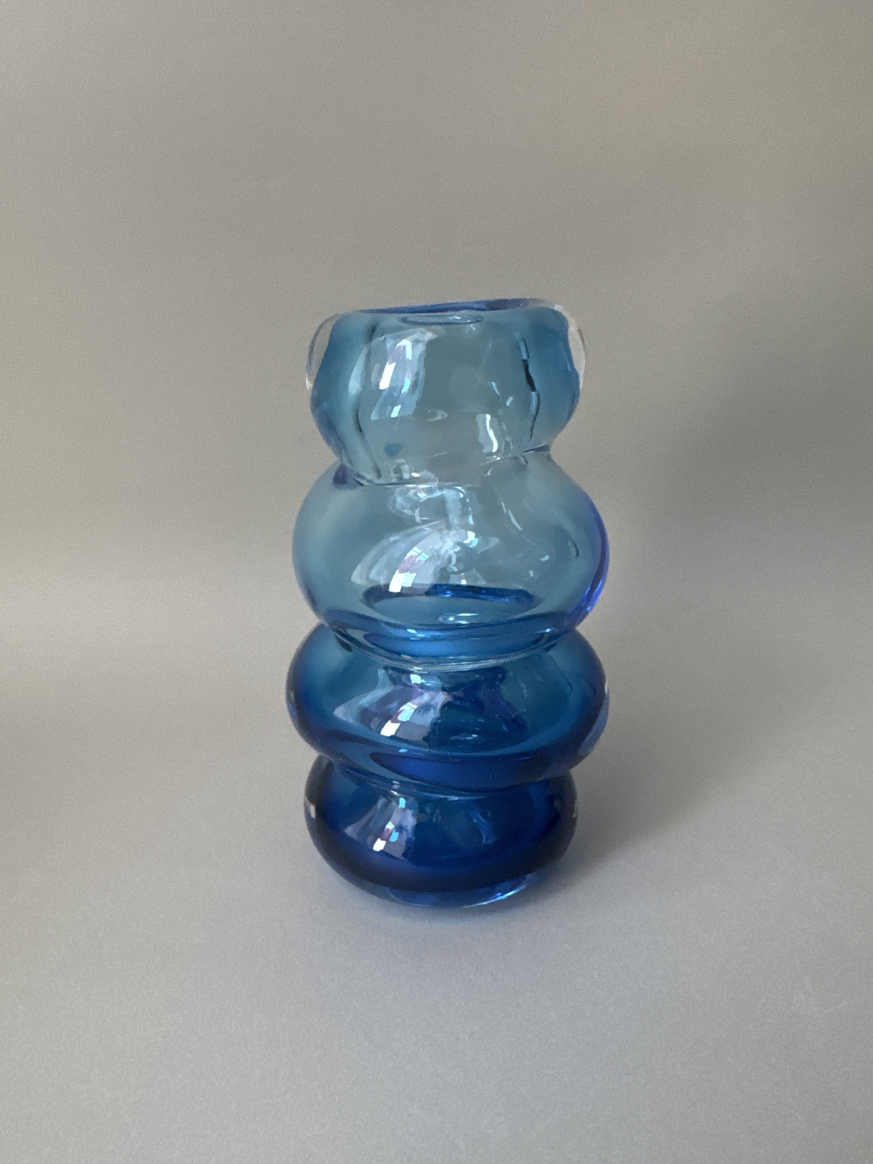 stone layered flower base blue