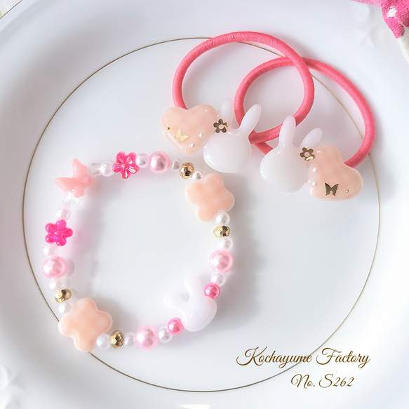 ピンクお花のうさぎヘアゴム✿ハンドメイド レジン ワイヤー スワロフスキー 兎 0df9558adb3282509614b2a29639e1