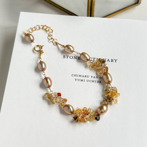 輪舞曲（ロンド）》シャンパンカラーの淡水パールとジルコンの