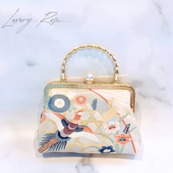 1月の新作♡悠々しい鳳凰ピンクゴールド口金の格の高い濃密刺繍の最高級西陣帯地！人気のホワイト系フォーマルパーティーバッグ 1枚目の画像