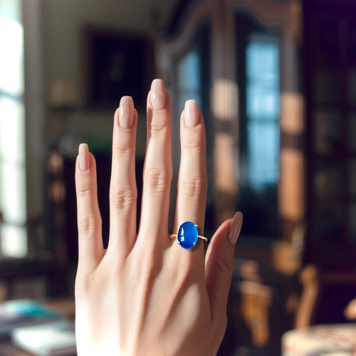深みブルーが指先を彩る・:*ブルーカルセドニーの艶オーバルリング