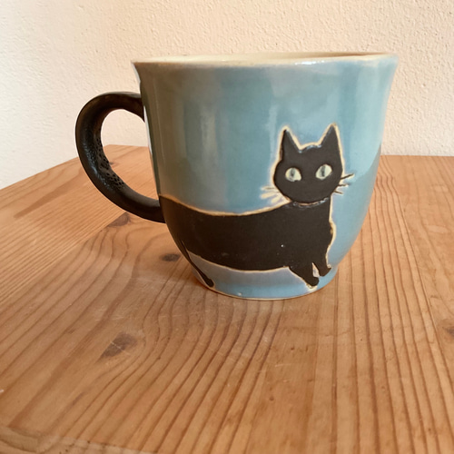 黒猫の水色のマグカップ マグカップ シャシャミミ 通販 20331404