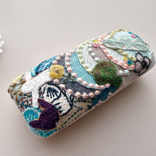 ミナペルホネン カケラのメガネケース タンバリン スカイフル