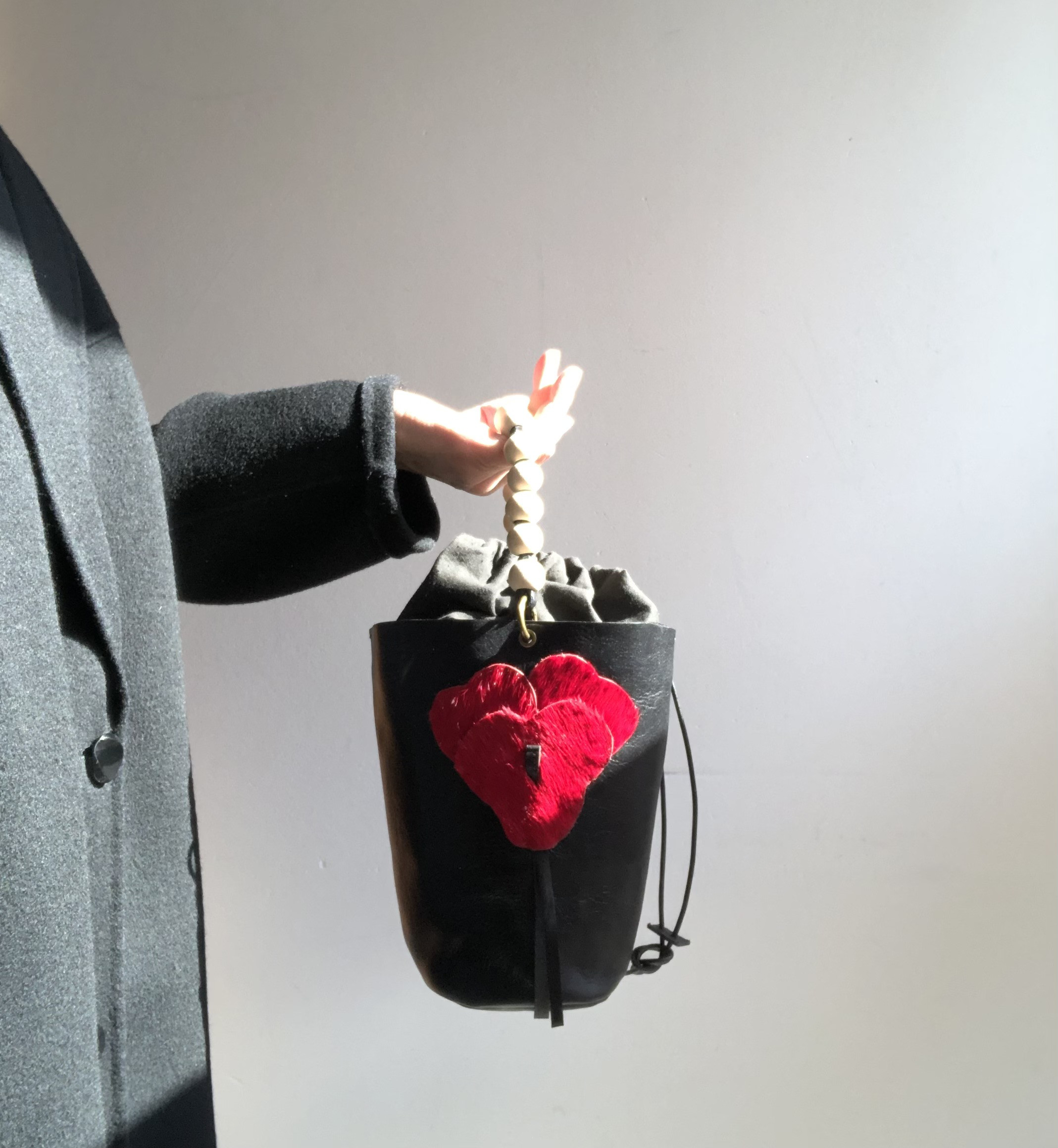 赤いハラコのパニエバッグ