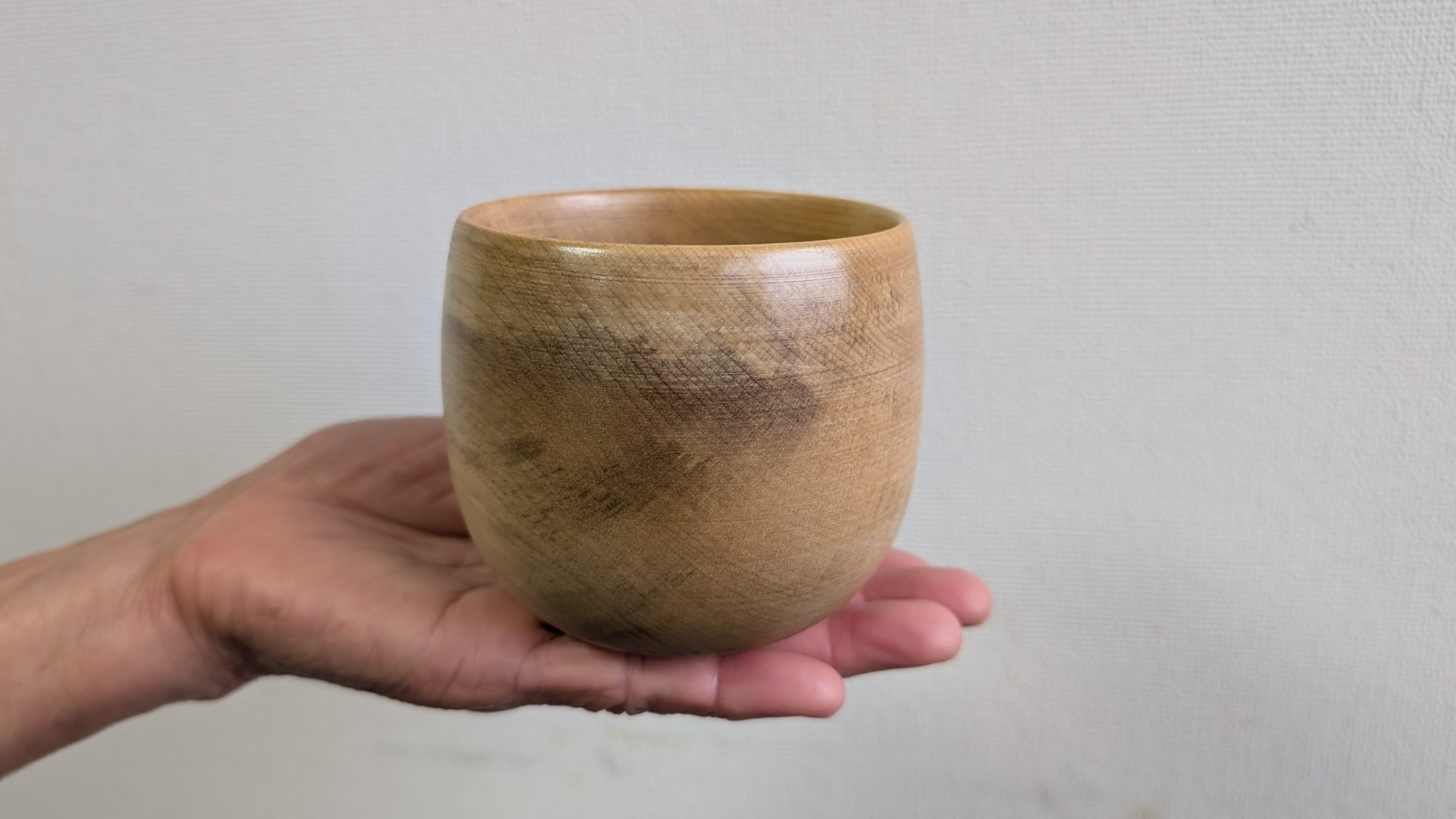 コブシの持ち手のないコーヒーカップ