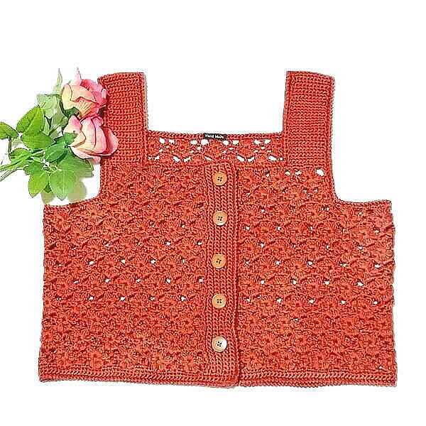 連続模様のベスト