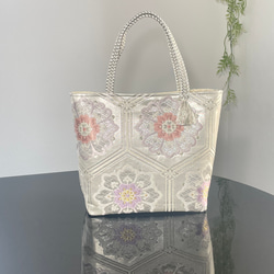 帯リメイクバッグ オレンジとゴールドの華文様 Mサイズ 和装バッグ 帯