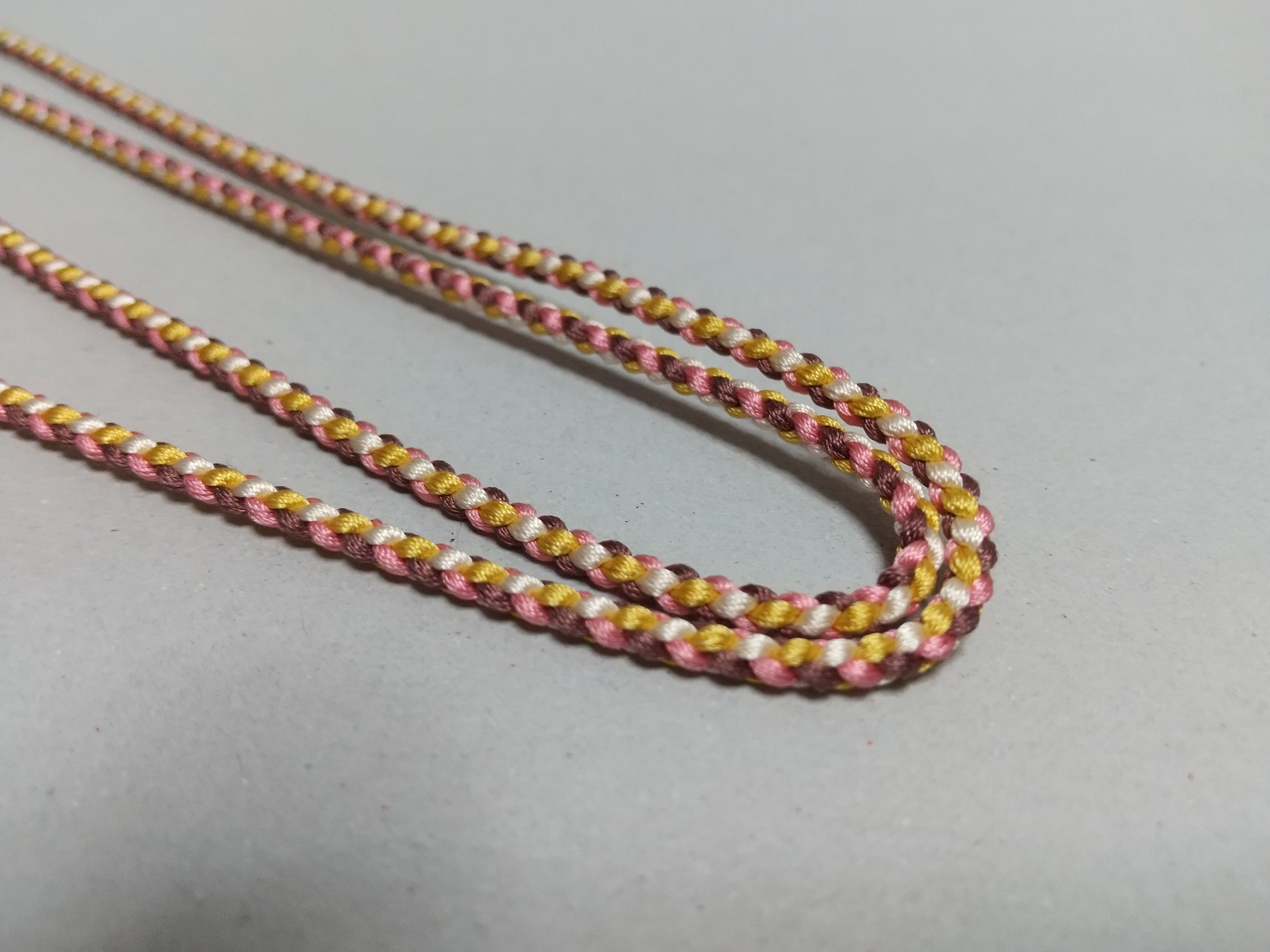 自由な紐(春色)　両房の始末済み　66cm　5mmの穴が通る　No.79/100