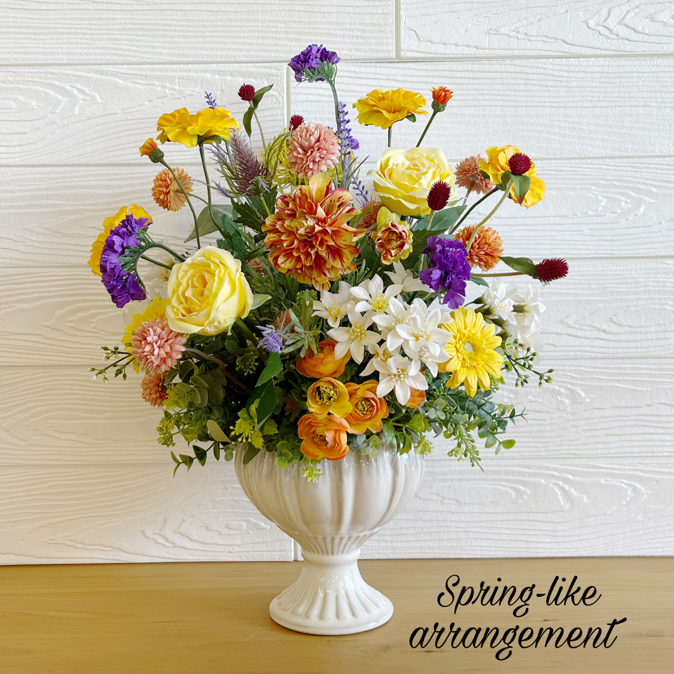 ビタミンカラーの可愛らしいフラワーアレンジメント