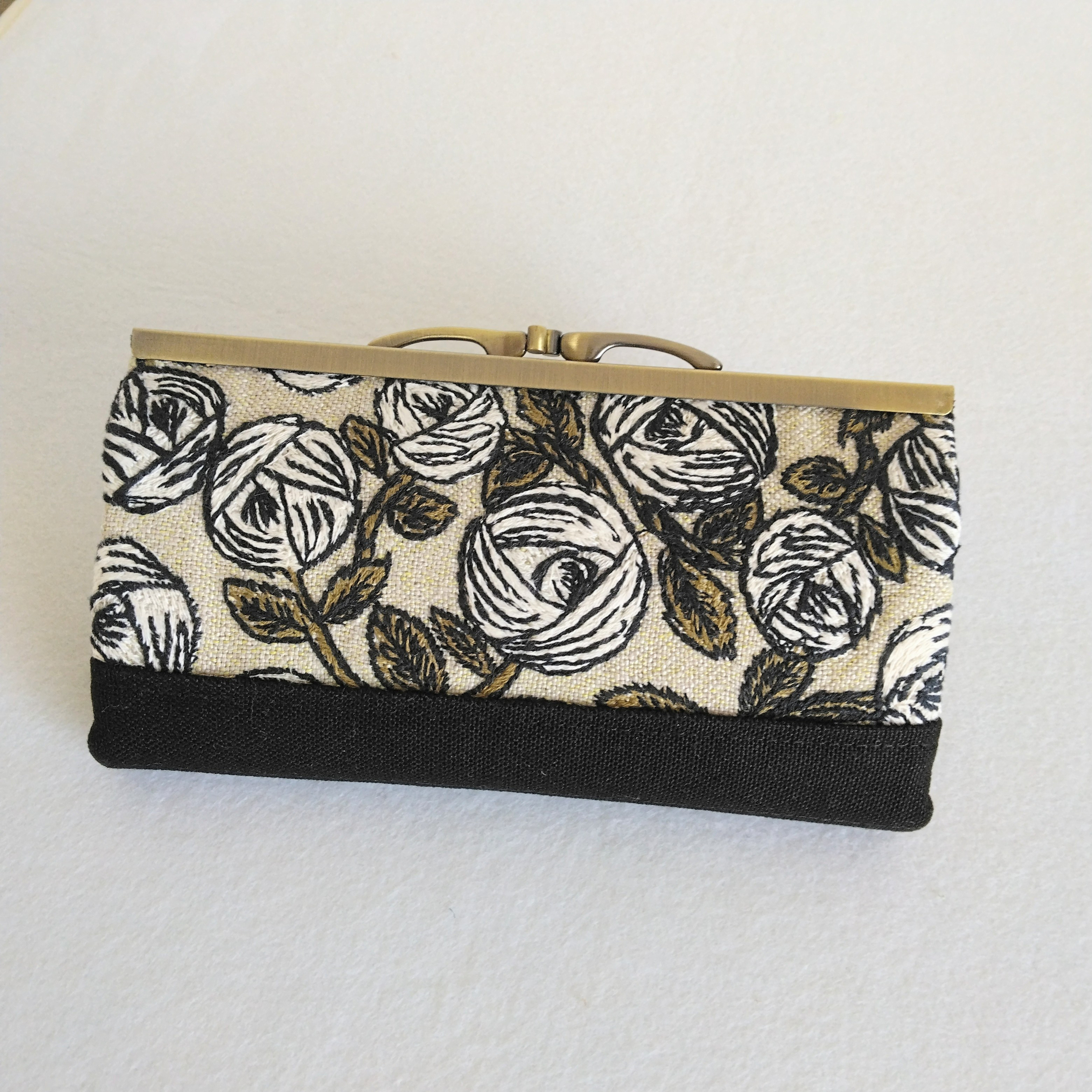ミナペルホネン rosy 浮足がま口長財布 5,775円