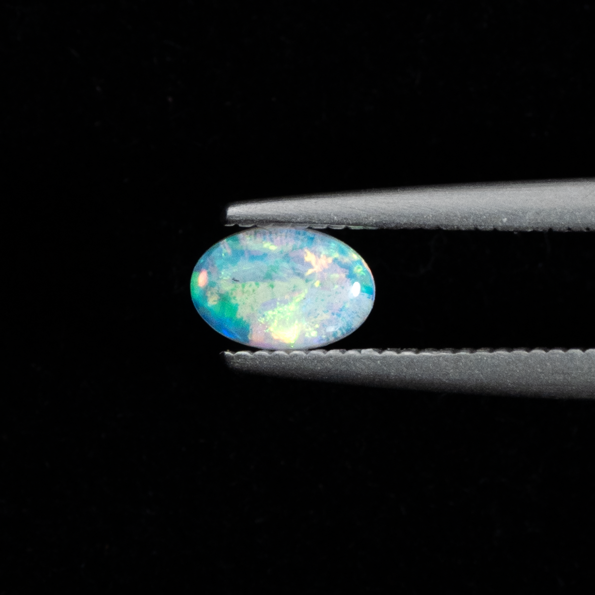 【輝く虹色の遊色が美しい】オーストラリア産オパール 0.28ct