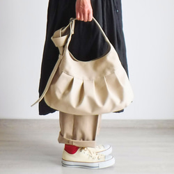⚮̈ミナペルホネン sulka white ネリオバッグ スルカ あおり巾着バッグ