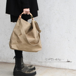 ハンドメイド　ミナペルホネン　あおりぽけっとの巾着トート⑅︎◡̈︎* ⚮̈ミナペルホネン choucho dark navy あおり巾着トート 巾着バッグ