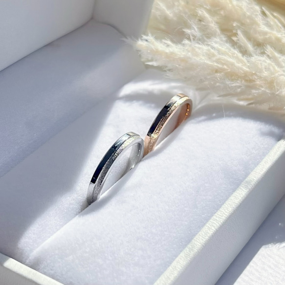 『未来のシルエット』肌に優しいペアリング 指輪 ブライダルリング 名入れ 刻印 ステンレス プレゼントキラキラ 結婚指輪 1枚目の画像
