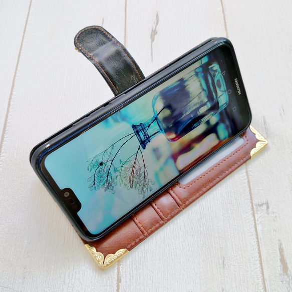 成人棕色智能手機保護殼，兼容所有型號 iPhone Android Xperia XZ3 AQUOS Sense 第3張的照片