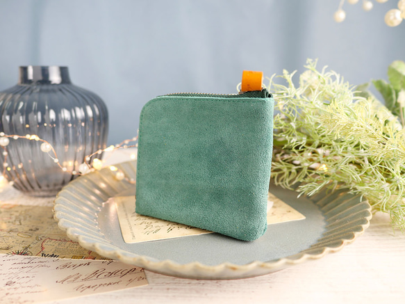ｷｭｲｰﾙﾃﾞｿﾝ スリムでシンプルなコンパクト財布　付属に栃木レザー使用《グリーン》 1枚目の画像