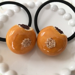 かじりかけあんぱんのヘアゴム♡けしの実 ヘアゴム tiruru 通販
