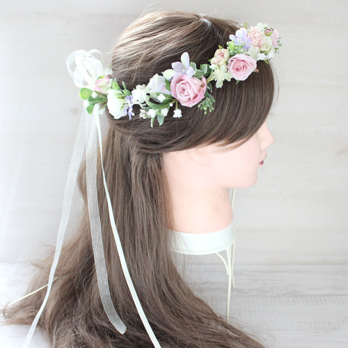 オーダーメイドブーケ22,000円～/淡いピンク×白×グリーンのクラッチ