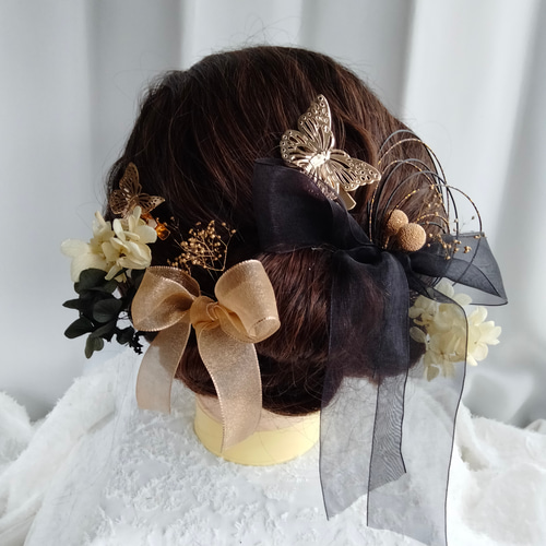 メタリックゴールドの蝶々とふた色のオーガンジーリボンの髪飾り 髪