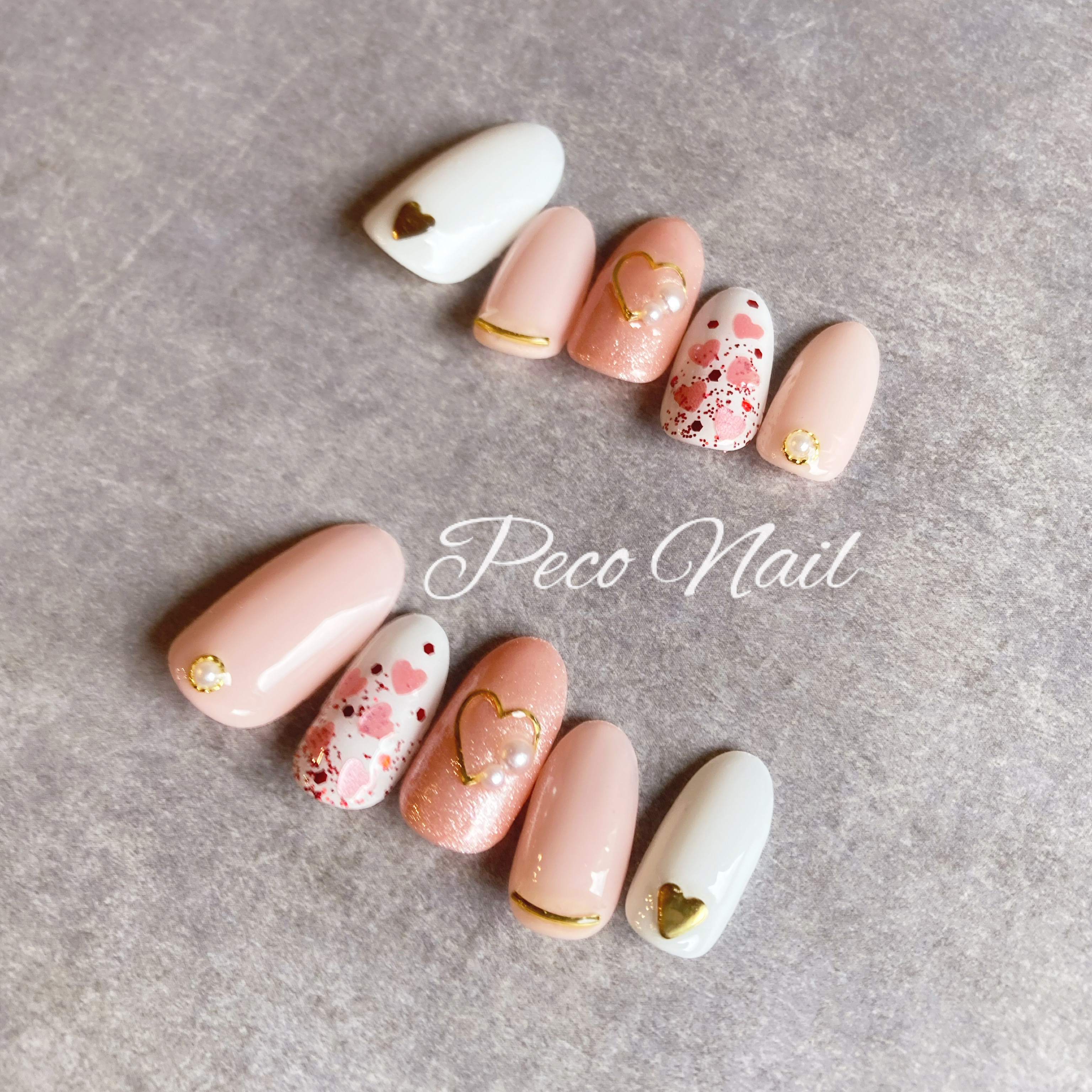 ピンク ネイルチップ エバーネイル　ハートモチーフ 現品】ネイルチップ ピンク 黒 ハート キラキラ - メルカリ