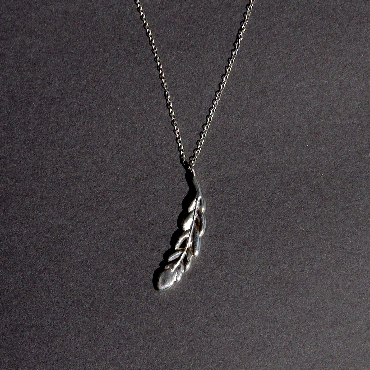 SV feather necklace