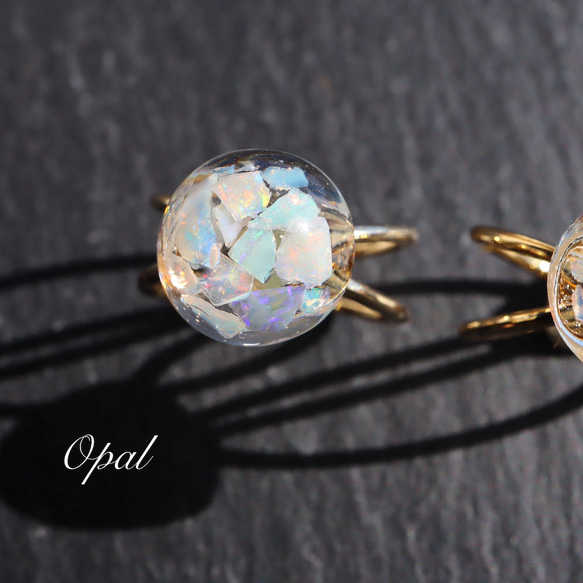 オパール レジン ダブルクロス Opal リング ゴール ドバンド フリーサイズ 指輪 天然石 原石 1枚目の画像