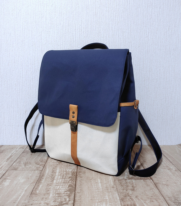 帆布簡單背包通勤上學 A4 兼容（深藍色 x kinari） 第1張的照片