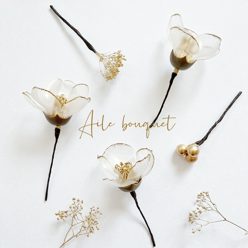 ヘッドドレス 花 透明 クリスタルフラワー クリア ディップフラワー 椿