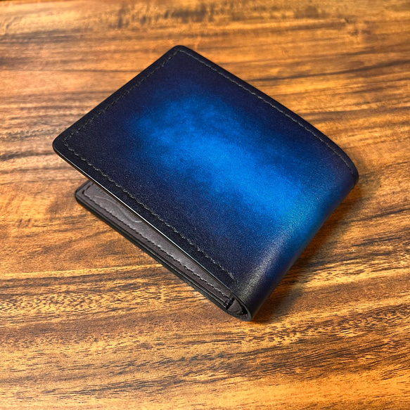革の手染め- 二つ折り財布 / ブルー（青+紺） 1枚目の画像