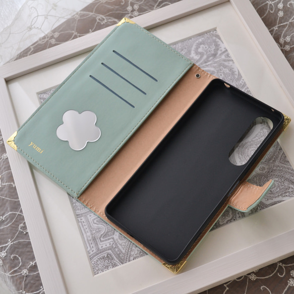 手帳型スマホケース『猫と音のiro –cats with drops』ミントグリーンと音符が大人かわいい！ 9枚目の画像