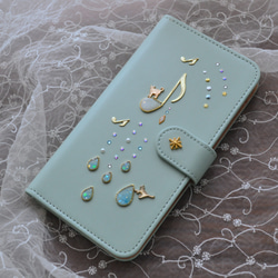 手帳型スマホケース『猫と音のiro –cats with drops』ミントグリーンと音符が大人かわいい！ 6枚目の画像