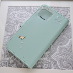 手帳型スマホケース『猫と音のiro –cats with drops』ミントグリーンと音符が大人かわいい！ 5枚目の画像