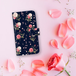 『柔らかいピンクの薔薇と音符 ネイビー』♪花と音符 iPhone/android ほぼ全機種対応 スマホケース 手帳型 1枚目の画像