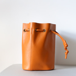 シンプルな牛革巾着バッグ斜め掛けショルダーバッグポーチ袋付きオレンジ色 9枚目の画像