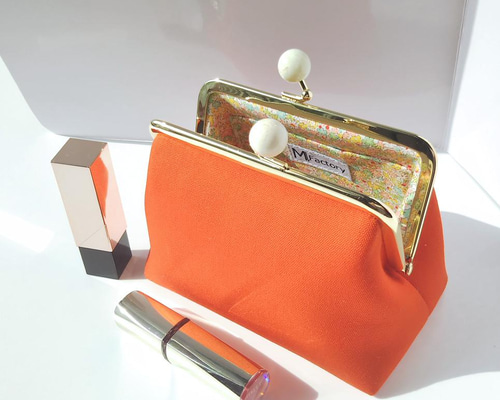 ビタミンカラー)オレンジのがま口 小さなポーチ がま口 mon-chan