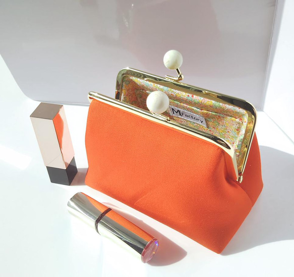 ビタミンカラー)オレンジのがま口 小さなポーチ がま口 mon-chan