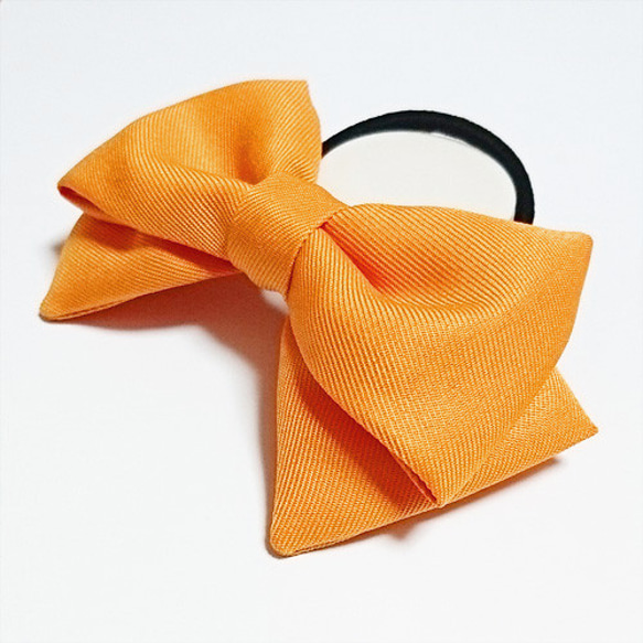 オレンジ色リボン ヘアゴム  髪飾り コスプレ衣装小物 ハンドメイド 橙色 1枚目の画像