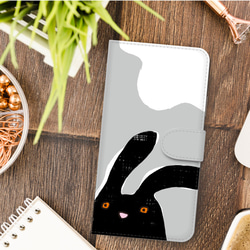 リラックス 風 に誘われる ウサギ イラスト の おしゃれ  スマホケース  iPhoneケース 手帳型 2枚目の画像