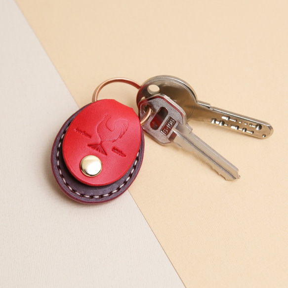 レザーキーホルダー『 momiji 』｜便利な500円玉が入るポケット付 1枚目の画像