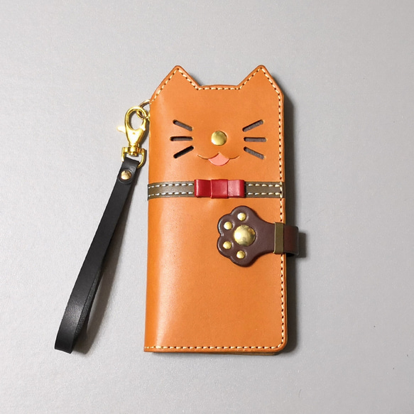 ＊仕舞い忘れのベロ出しにゃんこ＊leather sumyaho case＊手帳型レザースマホケース＊薄茶／全機種 1枚目の画像