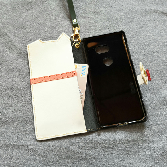 ＊仕舞い忘れのベロ出しハチワレにゃんこ＊leather sumyaho case＊手帳型レザースマホケース＊黒／全機種 3枚目の画像