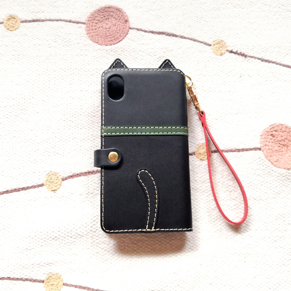 ＊仕舞い忘れのベロ出しにゃんこ＊leather sumyaho case＊手帳型レザースマホケース＊黒／全機種 2枚目の画像