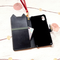 ＊仕舞い忘れのベロ出しにゃんこ＊leather sumyaho case＊手帳型レザースマホケース＊黒／全機種 3枚目の画像