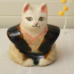 猫の福助　陶器のフクスケ人形　ねこ　陶器・陶芸　茶＋黄色 1枚目の画像
