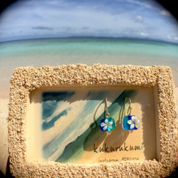 海に浮かぶプルメリアピアスと星砂のフォトフレーム 5枚目の画像